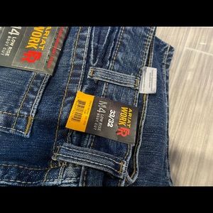 Brand new with tags Ariat Flame resistant M4 jeans. Low rise, boot cut. 33/32